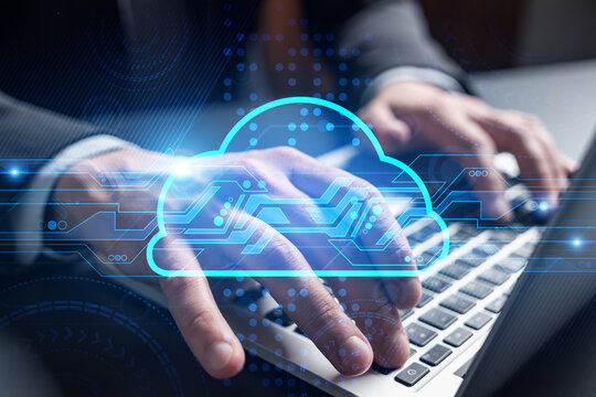 Businessman takes notes, typing laptop background and cloud icon drawing.