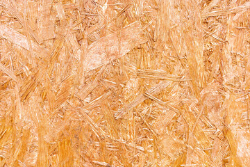 OSB plywood or oriented strand board, wood wall background texture