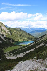 Naklejka na ściany i meble Seebensee in front of the beautiful Zugspitze in Tyrol
