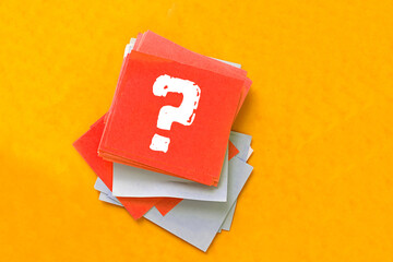 Question mark on sticky note concept