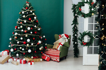 Christmas tree pine green interior room new year decor garland gifts postcard