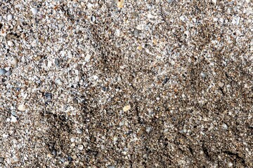 Background and texture of sand close up. Sea coast