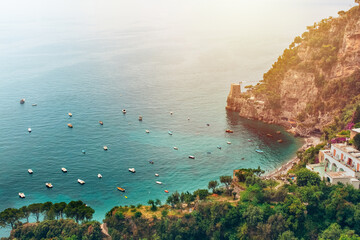 View from above of postino mountain and boats in the sea italy amalfi