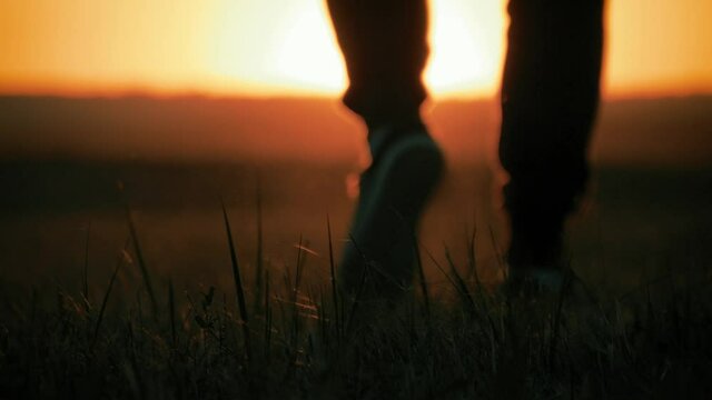 Hiker silhouette at sunset, concept trip lifestyle.