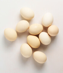 Chicken eggs on a white background. White egg. Top view