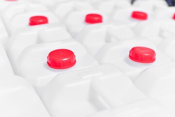 Group of White Gallons in Production Line