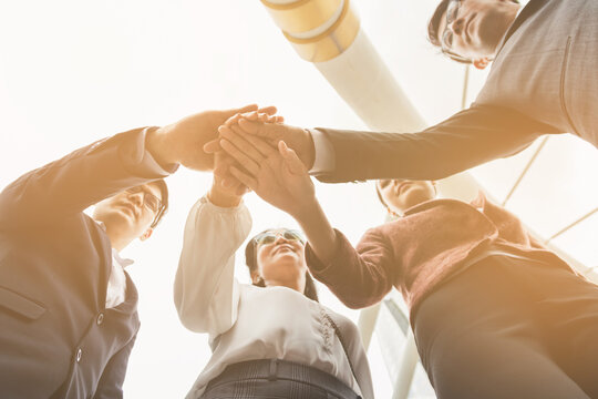 Close up Business people shaking hands, putting their hands together, finishing up meeting. Deal Successful