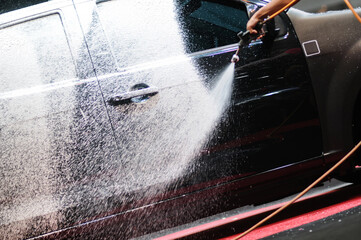 Car wash foam on the surface of the car.