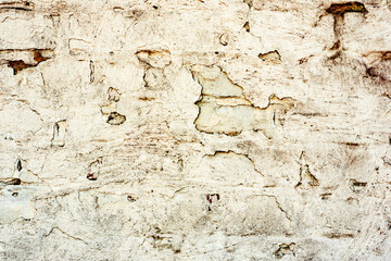 Texture of a concrete wall with cracks and scratches which can be used as a background