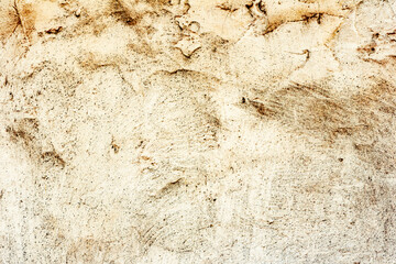 Texture of a concrete wall with cracks and scratches which can be used as a background