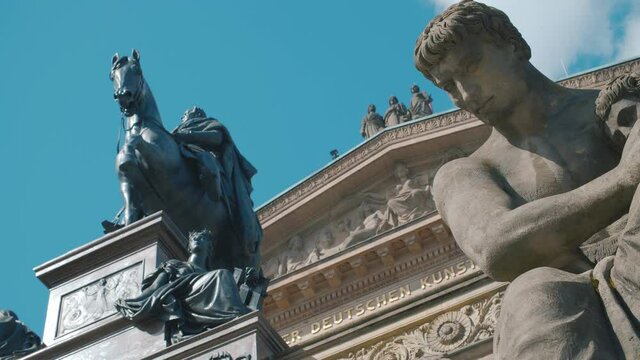 Old National Gallery in Berlin, Germany with Statues and historical Fascade. Cultural Art Museum in Central Europe.