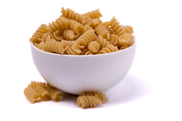 bowl filled with rigatoni isolated on a white background