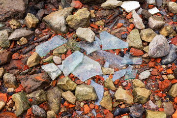 Shards of glass on coastal rocks