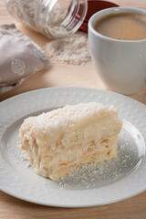 .Coconut cake. made with puff pastry and known in Brazil as the Napoleon Hat