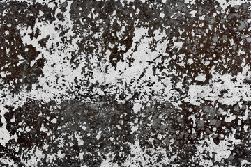 Texture of a concrete wall with cracks and scratches which can be used as a background