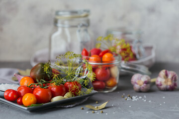 Ingredients for making healthy vegetarian food. Pickled Vegetables. Tomatoes being prepared for preserving. Clean eating, vegetarian food concept