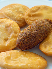 Fried Dominican pastelito and kipe or fried patties or turnover and a Kibbeh 