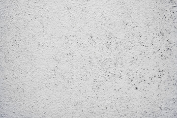 Texture of a concrete wall with cracks and scratches which can be used as a background