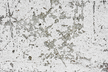 Texture of a concrete wall with cracks and scratches which can be used as a background