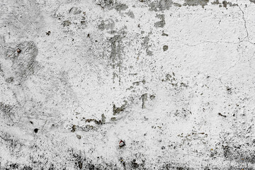 Texture of a concrete wall with cracks and scratches which can be used as a background