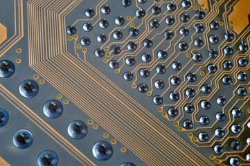 pins on the back of the motherboard close-up.