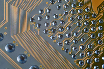pins on the back of the motherboard close-up.