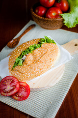 Delicious and Tasty Sandwiches on wood cutting board tomatoes
