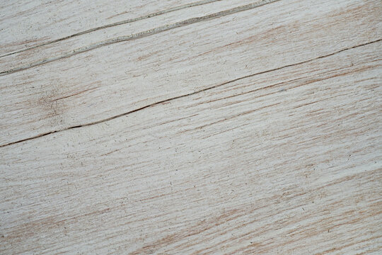 Old board painted with white paint