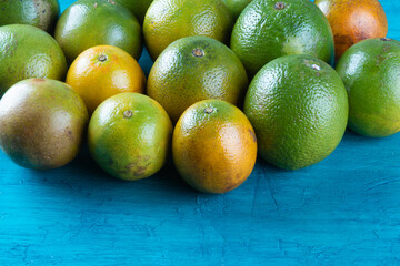 Orange fruit closeup. Tropical fruits. Copy space.
