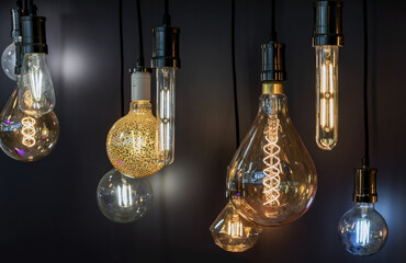 Fototapeta na wymiar Light bulbs with dark glass in vintage style. Edison's lamps.
