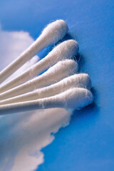 cotton swab close up macro on blue background