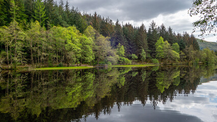 Fototapeta na wymiar Reflections in a Scottish Loch
