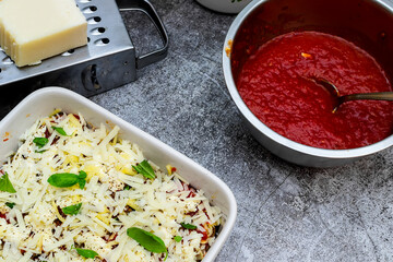 Parmigiana di Melanzane - strips of fried eggplant with parmesan