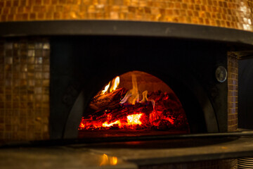 Pizza making on wood fire oven 