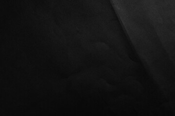 Crushed black paper abstract background