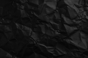 Crushed black paper abstract background