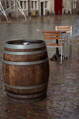 Wooden table and barrel after the heavy rain in Leiden, Netherlands