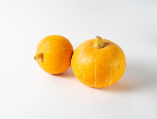 pumpkin on white background, concept for halloween, harvesting. food without chemistry