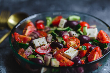 Greek salad on grey surface
