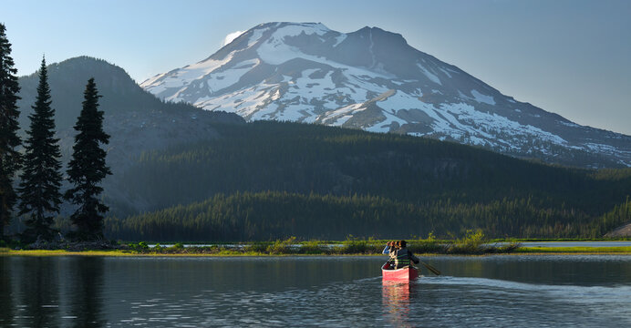 Pair canoeing on Sparks Lake near Bend Oregon