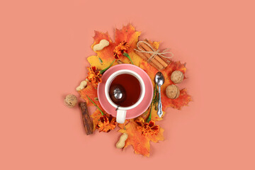 Autumn composition flat lay, seasonal background with maple leaves, cinnamon and tea, place for...