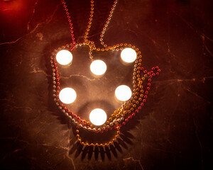 A cup of hot coffee made from candles as an abstract idea