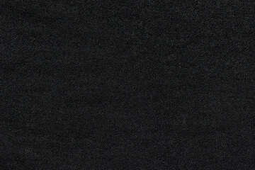 Abstract black synthetic fabric texture and background. Detail of canvas textile material.