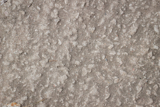 Photo of gray natural concrete old wall texture. Grey washed cement surface. Horizontal.