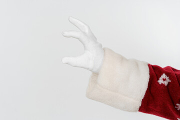 Santa Claus shows the size with his fingers. Isolated background