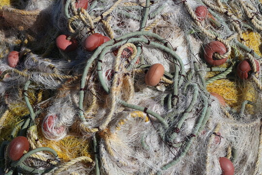 Closeup of a fishing net. After the net is not longer usable it can be recycled. 