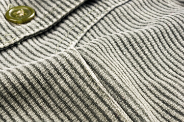 clothing items stonewashed cotton fabric texture with seams, clasps, buttons and rivets, macro