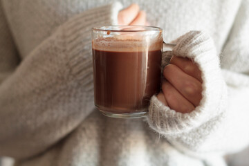 Girl holding a cup of hot chocolate