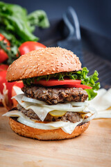 Delicious Burger on the chopping Board.
