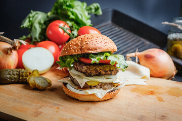 Delicious Burger on the chopping Board.